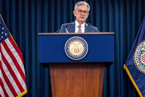 US Federal Reserve Chair Jerome Powell said there is 'a lot of we have to ground to cover' before the economy recovers the 10 million jobs lost in the pandemic