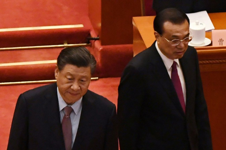 Chinese Premier Li Keqiang -- seen here with President Xi Jinping (L) at the opening ceremony of the Chinese People's Political Consultative Conference (CPPCC) -- will address the nation to kick off the country's annual legislative session