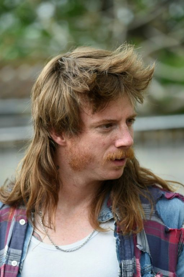 A man takes part in the mullet haircut festival in Boussu in 2019