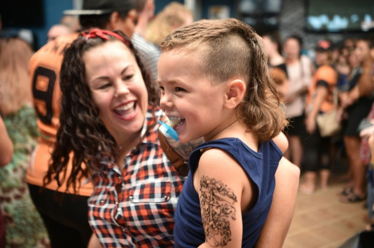 A child sports a mullet haircut at Mulletfest 2018 in the town of Kurri Kurri, Australia in 2018