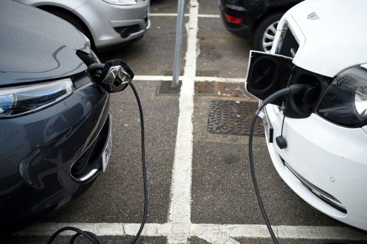 Electric vehicles charge at a charging station in east London