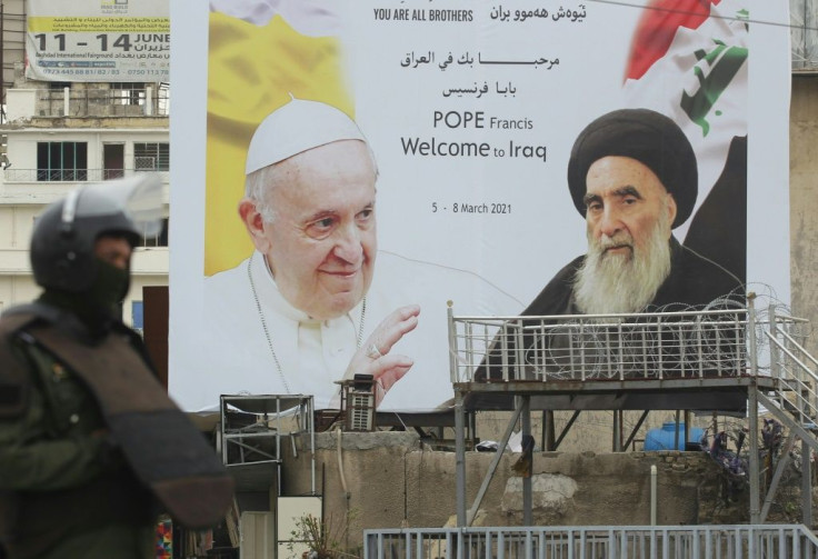 A billboard celebrates the meeting between Pope Francis and Grand Ayatollah Ali Sistani on the pontiff's second day of his historic visit to Iraq