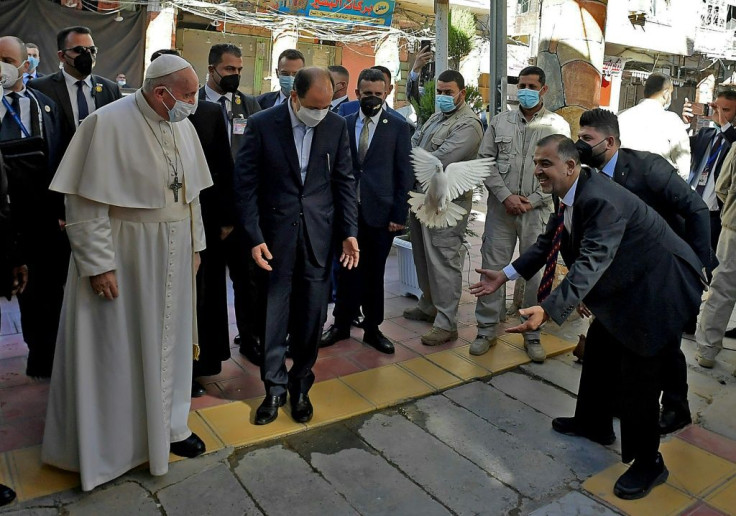 Grand Ayatollah Ali Sistani told Pope Francis that Iraq's ancient but often persecuted Christian community should live "in peace and security, and with their full constitutional rights"