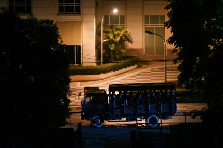 Overnight raids in Yangon saw an official from Aung San Suu Kyi's NLD party beaten to death and several others detained