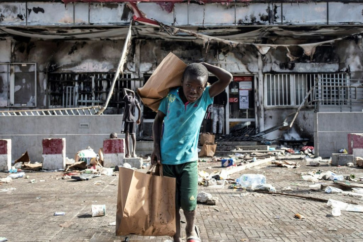 Shops were torched and looted in the unrest