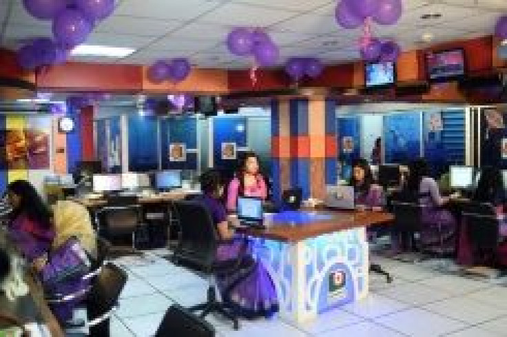 Tashnuva Anan Shishir (R) delivered a word-perfect debut to become Bangladesh's first transgender television news presenter