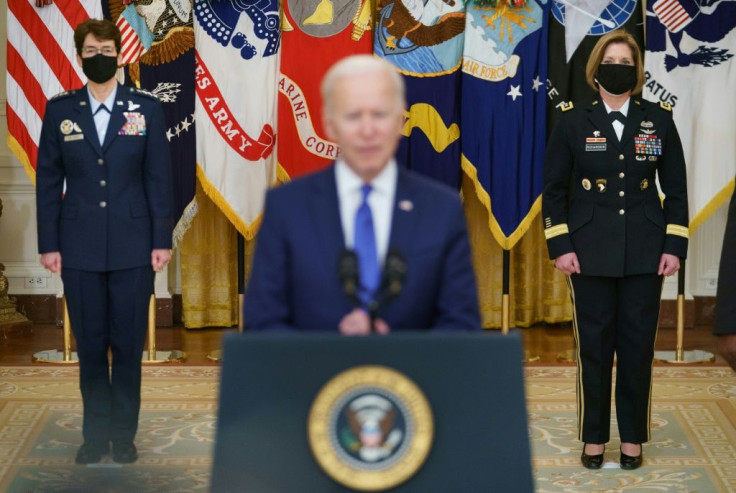 President Joe Biden introduces generals Jacqueline Van Ovost (L) and Laura Richardson (R), who have been nominated to lead US military commands, at the White House in Washington, DC