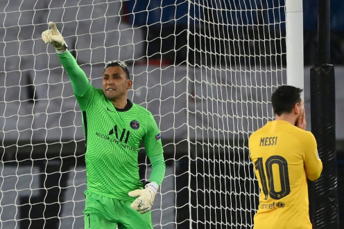A Keylor Navas save from Lionel Messi's penalty helped secure Paris Saint-Germain's qualification for the Champions League quarter-finals at Barcelona's expense