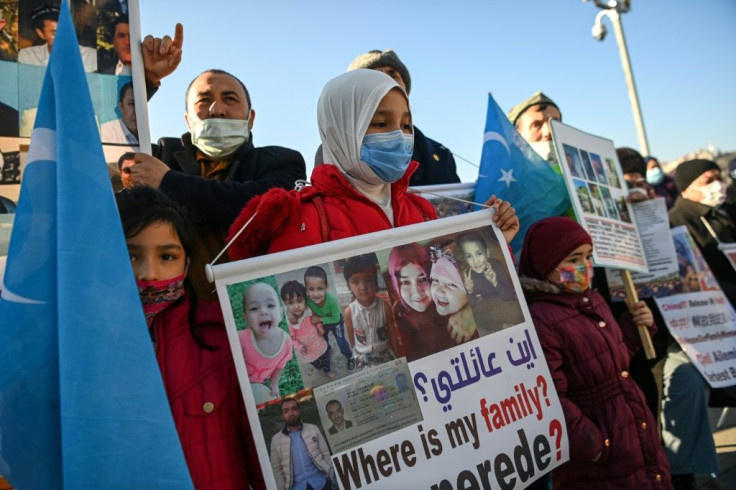 Members of Uighur minority demonstrate near the Chinese consulate in Istanbul