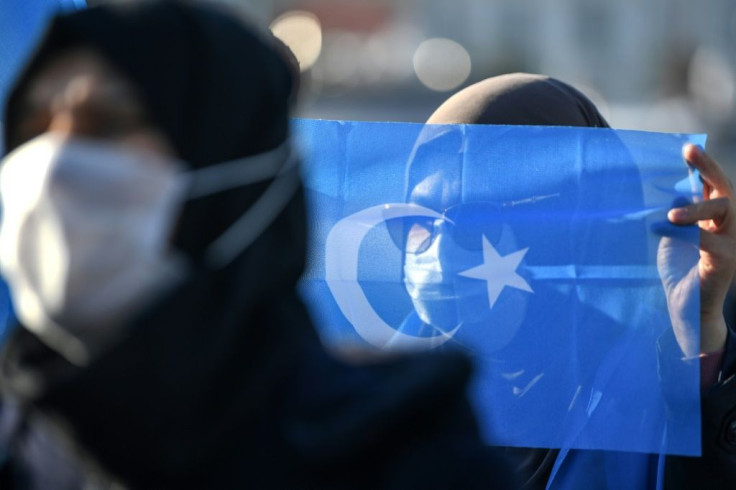 Uighurs complain of escalating police raids on their homes, forcing some to once again pack up their belongings and seek sanctuary in Europe