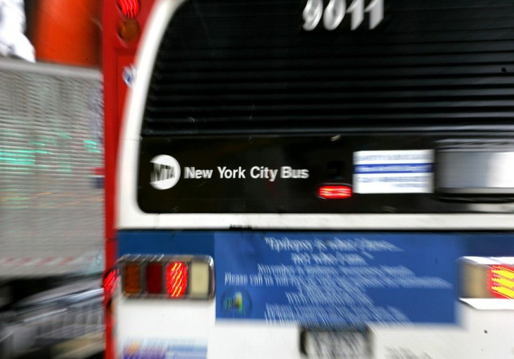 A New York City Metropolitan Transportation Authority (MTA) bus heads west on New York&#039;s 42nd Street..