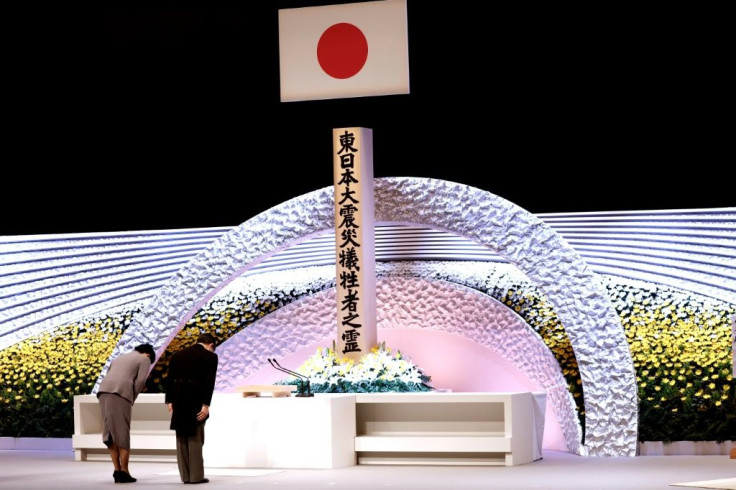 Speaking at a ceremony in Tokyo's national theatre, Emperor Naruhito said the "unforgettable memory of the tragedy" persisted a decade on