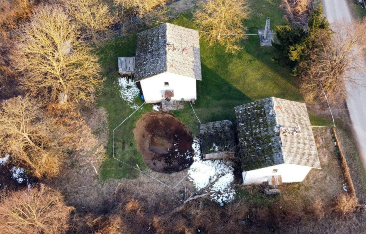 Aftershocks from a December earthquake cause sinkholes to open up across Croatian farmland