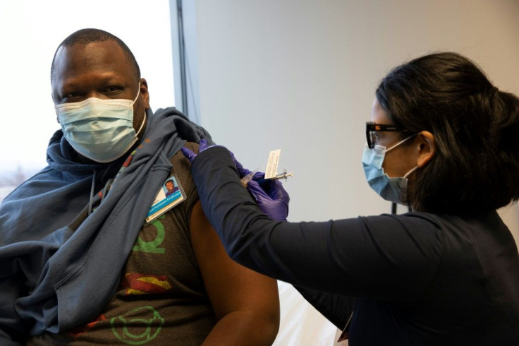 A volunteer receives a shot during the clinical trial for Novavax's Covid-19 vaccine