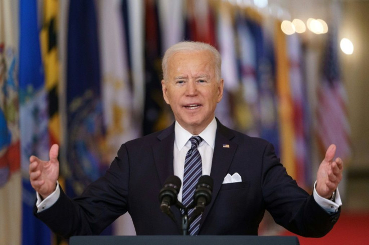US President Joe Biden, seen delivering a nationwide address on the Covid-19 pandemic, will hold a first-ever joint summit with the prime ministers of Australia, India and Japan