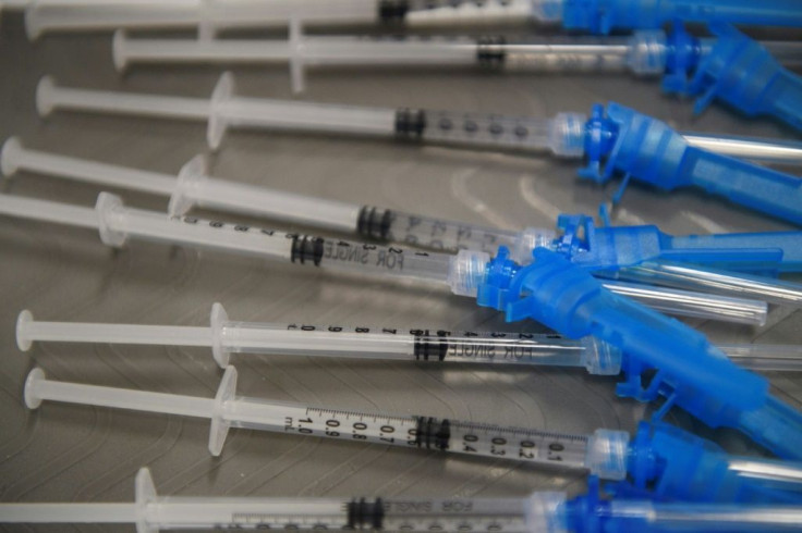 Syringes with doses of the Johnson & Johnson Covid-19 vaccine await recipients at a vaccination site at Baldwin Hills Crenshaw Plaza on March 11, 2021 in Los Angeles, California