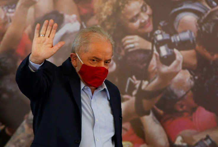 Brazilian former president (2003-2011) Luiz Inacio Lula da Silva, waves as he arrives for a press conference in Sao Bernardo do Campo, in metropolitan Sao Paulo, Brazil, on March 10, 2021