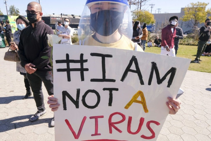 A protester takes part in a rally to raise awareness of anti-Asian violence, near Chinatown in Los Angeles, California, on February 20, 2021