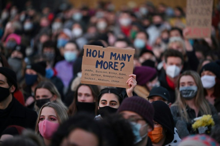 Officers scuffled with some members of a crowd that gathered despite coronavirus restrictions for a candlelit tribute to 33-year-old marketing executive Sarah Everard, who disappeared on March 3