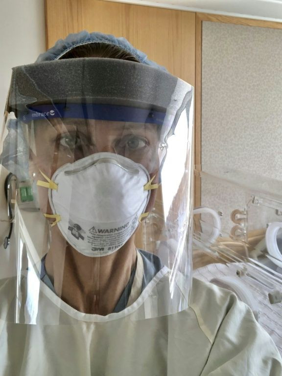 Midwife Julie Mann's interactions with patients changed after Covid-19 forced her to wear protective gear