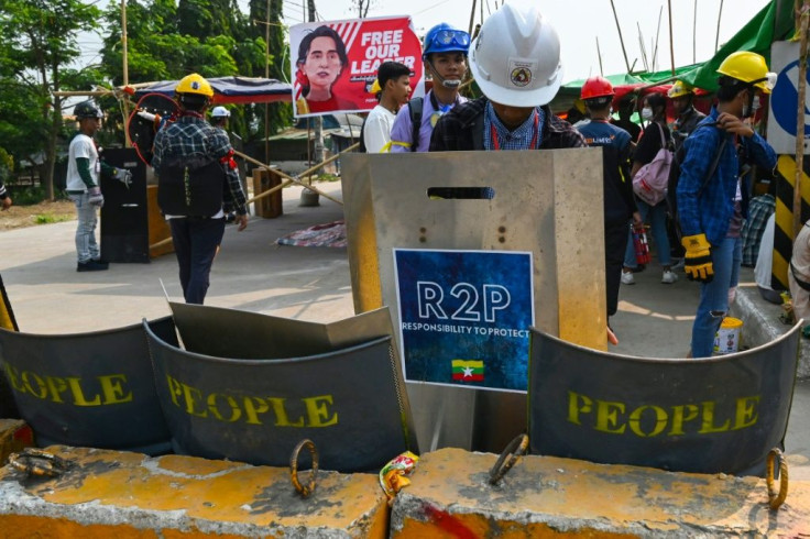 Yangon has been transformed since the coup, with key protest townships barricaded with sandbags, wooden fences and stacked tables