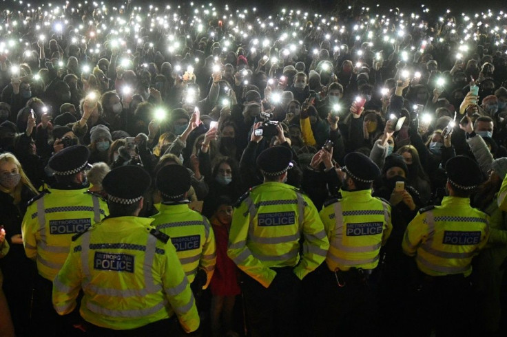 Mourners shouted "shame on you" at police