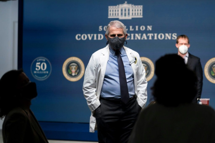Dr. Anthony Fauci, the top White House advisor on Covid-19, is seen at a Washington event on February 25, 2021; he says authorities are weighing a significant change in social-distancing rules to 3 feet, not 6