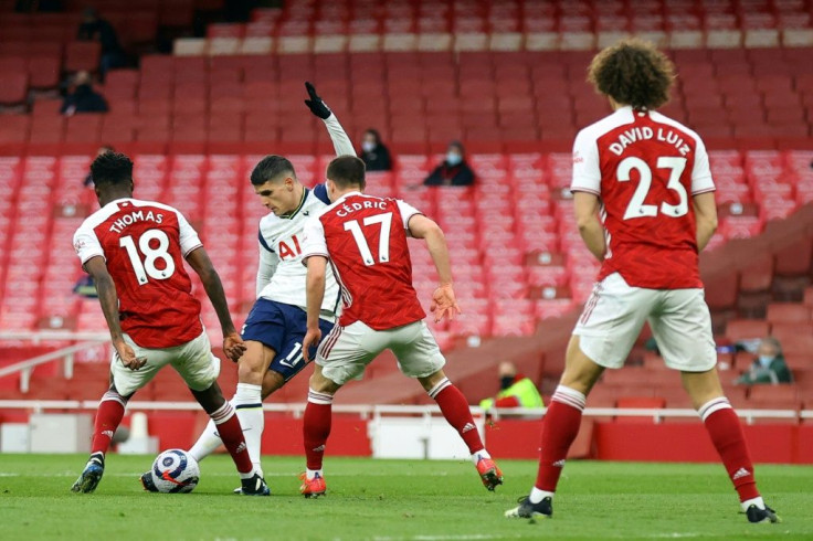 Rabona magic: Tottenham's Erik Lamela (2nd left) opened the scoring against Arsenal in spectacular style