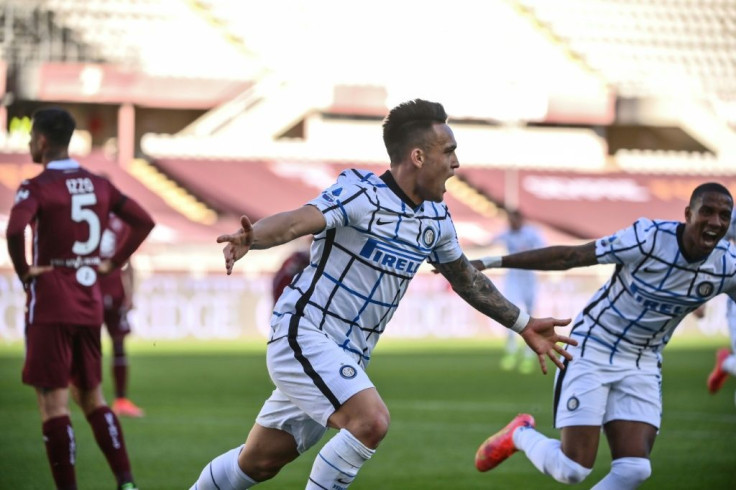 Lautaro Martinez's (C) winner keeps Inter on track for a first title since 2010.