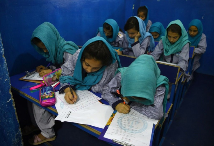 Afghan schoolgirls taking mid-term exams at a school in Kabul