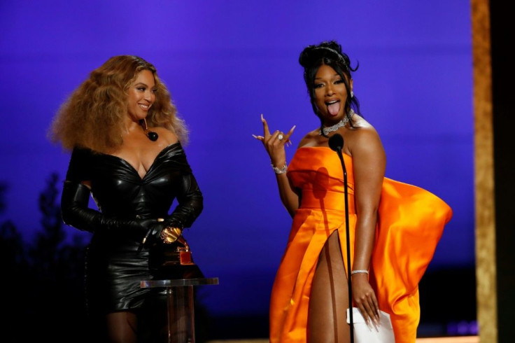 Beyonce and Megan Thee Stallion accept a Grammy for "Savage," a remix that was a massive success
