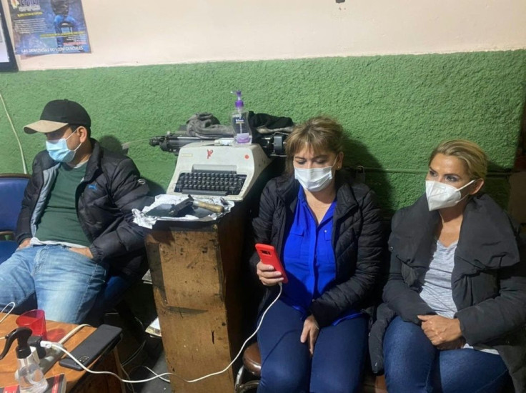Bolivia's ex-president Jeanine Anez (R) is seen during a virtual hearing in La Paz on March 14, 2021