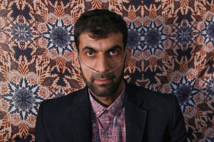 Hawker Saber, 36, has had to use a respirator since the 1988 chemical attack on the Kurdish town of Halabja in northeastern Iraq