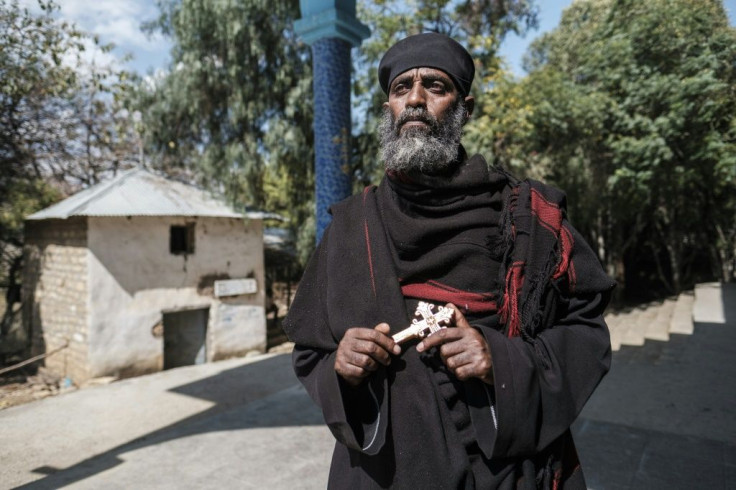 Priest Gebrehana Hailemariam says he has buried dozens of young men killed in Wukro