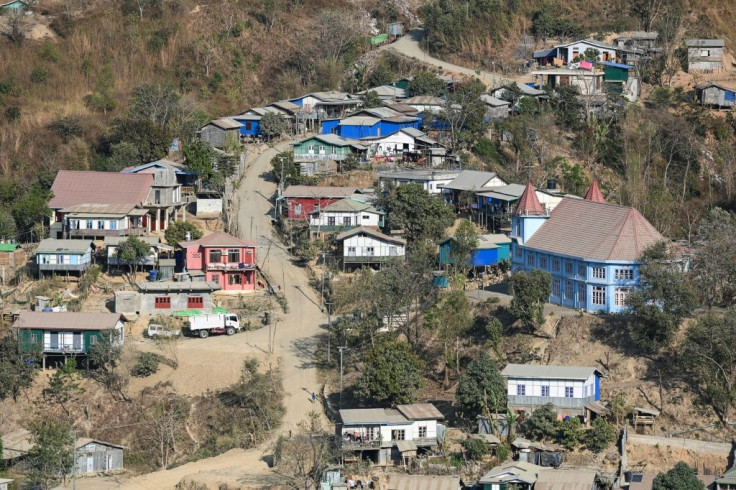 Houses are seen on the Myanmar side of the border at Zokhawthar in India's northeastern state of Mizoram