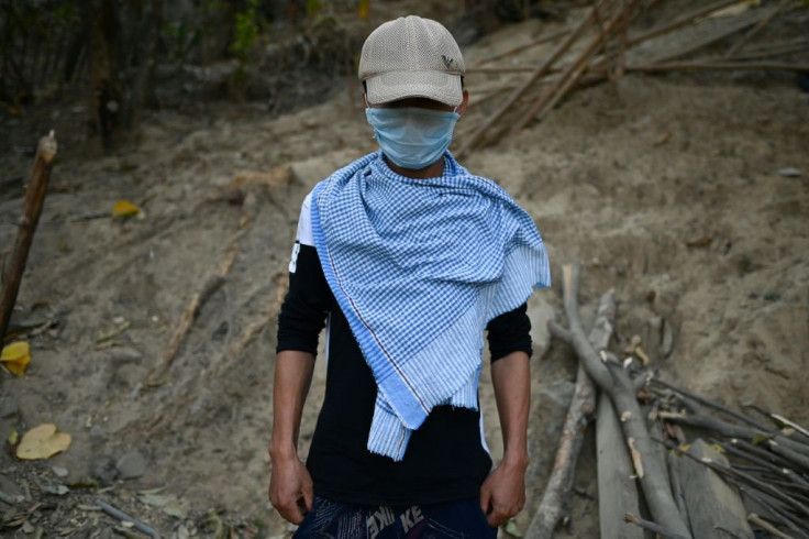 Dozens of Myanmar nationals, including this soldier, have crossed into northeast India's Mizoram state following the military coup and crackdown on protests