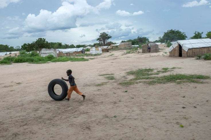 A child plays with a car tire in the Tara Tara district of Matuge, northern Mozambique. The area functions as a center for internally displaced persons who fled their communities due to attacks by armed insurgents in the northern part of the Cabo Delgado 