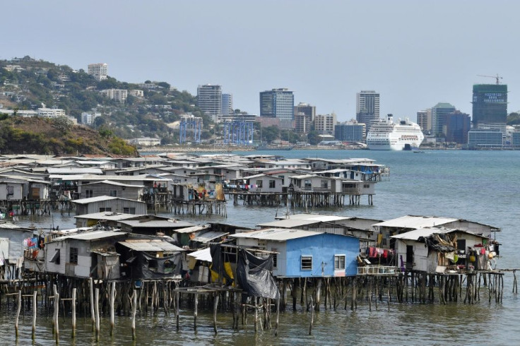 Australia says hospitals in the PNG capital Port Moresby are detecting Covid in about half of new patient admissions