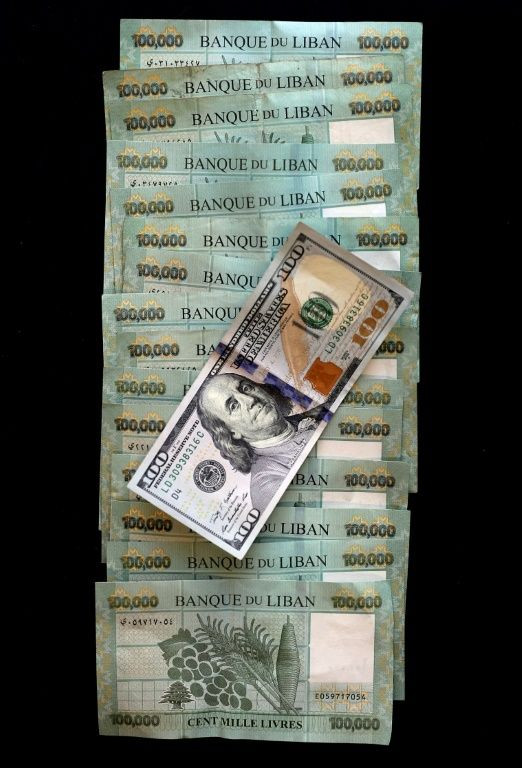 A 100-dollar bill now changes hands for a record 1.5 million Lebanese pounds on the black market after the currency lost almost 90 percent of its value over the past 18 months