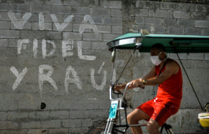 A poster in Havana reads 'Long Live Fidel and Raul' -- the brothers Castro who will for the first time in 60 years not be in power in Cuba