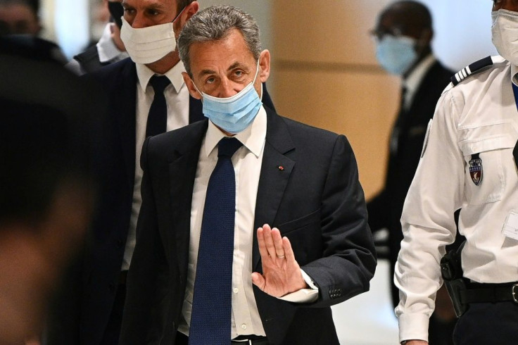 Former French president Nicolas Sarkozy arrives March 1 at a Paris court to hear the final verdict in a corruption trial