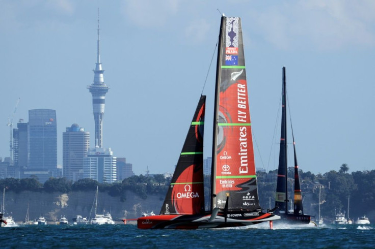 Team New Zealand (L) won their fourth America's Cup title