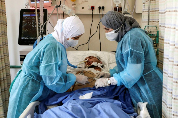 Palestinian health officials say West Bank hospitals are overwhelmed with coronavirus patients