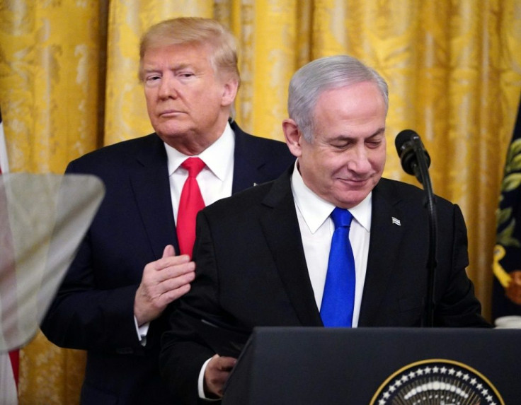 A file photo from January 28, 2020 shows then US president Donald Trump and Israeli Prime Minister Benjamin Netanyahu on the day they announced Trump's Middle East peace plan in the White House