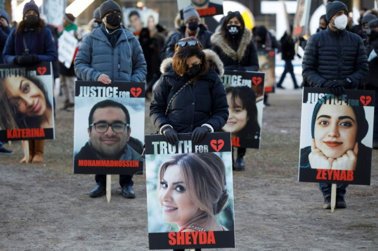 In this January 8, 2020 image, people in Toronto mark the first anniversary of the shoot-down