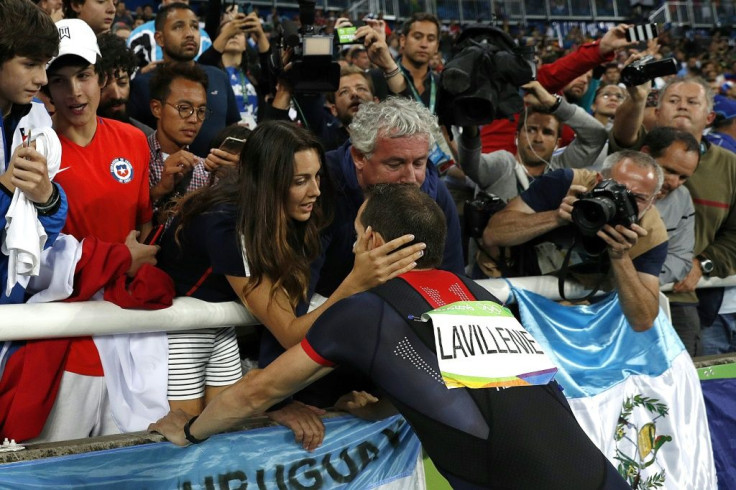 Consoling arms: After Renaud Lavillenie finished second in Rio he was comforted by his partner Anais Poumarat and coach Philippe D'Encausse. That is unlikely to be an option in Tokyo