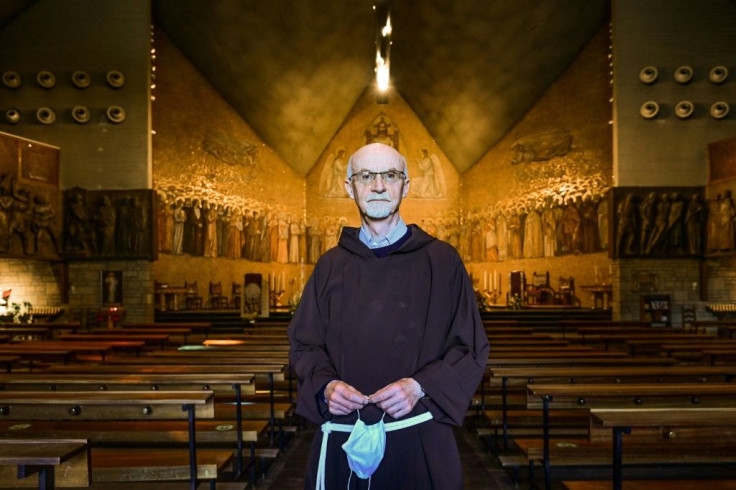 Father Marco Bergamelli: 'The trucks came at night, nobody was supposed to know the coffins were being taken elsewhere'