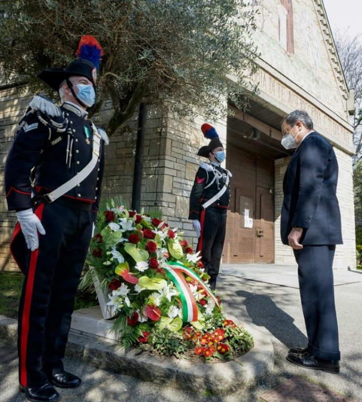 Italy's Prime Minister Mario Draghi attends a memorial ceremony in Bergamo