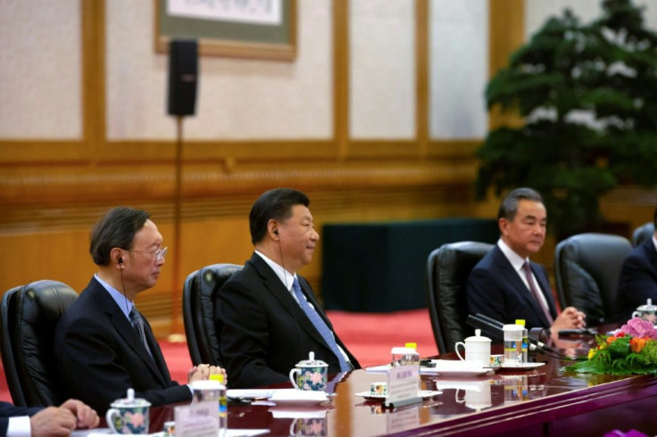 Senior Chinese official Yang Jiechi (L), China's President Xi Jinping (C), and China's Foreign Minister Wang Yi (R) in Beijing in 2019