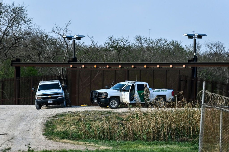 US border Police patrol on the bank of Rio Grande near the Gateway International Bridge, between the cities of Brownsville, Texas, and Matamoros, Mexico on March 16, 2021 in Brownsville, Texas